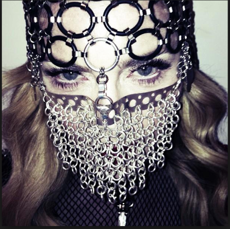 Madonna using Islam elements suddenly and claiming to study "Islam" while using published copyrighted Data from muslim Arab Woman...aha